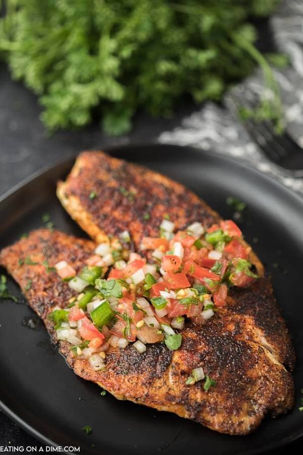 blankend tilapia with garlic lime butter in cast iron